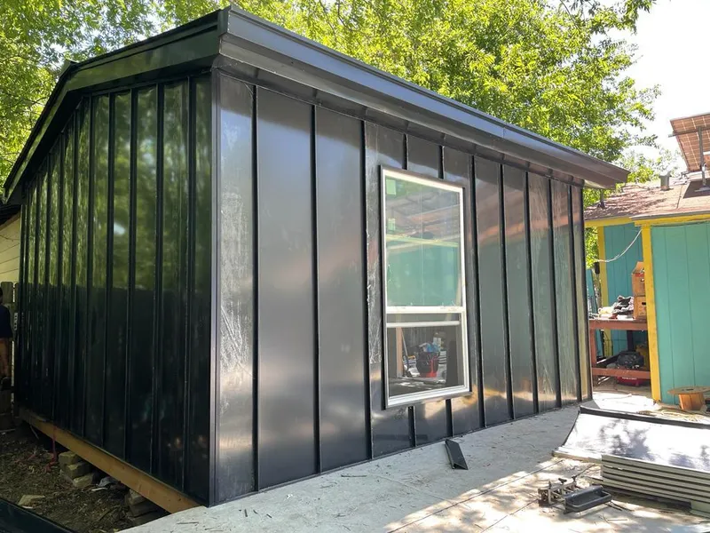 Black standing seam metal wall panels for Metal Roof Installation in Endicott