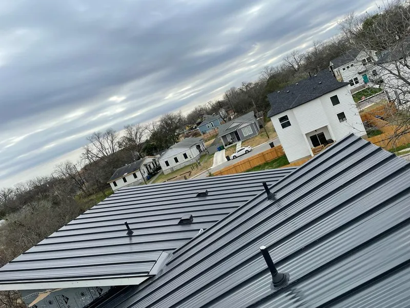 Standing seam metal roof panels with vents for Skylight Repair in Endicott